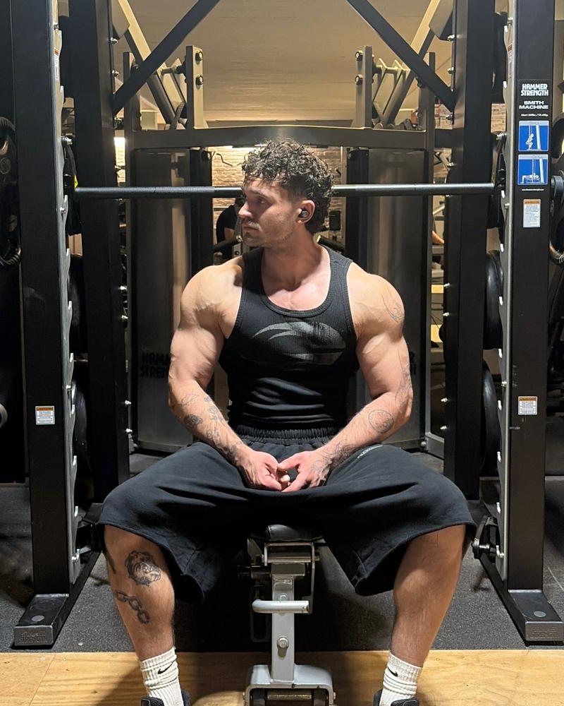 Eros, personal trainer, in de gym